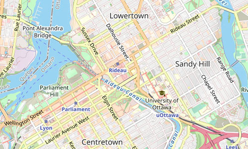 Map showing downtown Ottawa, Canada, including landmarks like the Rideau Canal, Parliament Hill, University of Ottawa, Sandy Hill, Lowertown, Centre Town, and the Pont Alexandra Bridge over the Ottawa River. Major Ottawa roads and parks are visible.