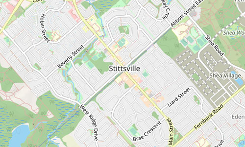 Map view of Stittsville, highlighting labeled streets like Main Street, Beverley Street, Abbott Street East, Shea Road, and West Ridge Drive, with residential areas and green spaces defining the Stittsville landscape.